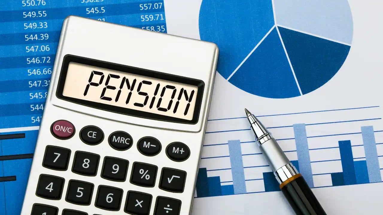 NPS में सही एन्युटी प्लान कैसे चुनें? जानिए पूरी जानकारी "Pension" with charts and a pen, symbolizing financial planning
